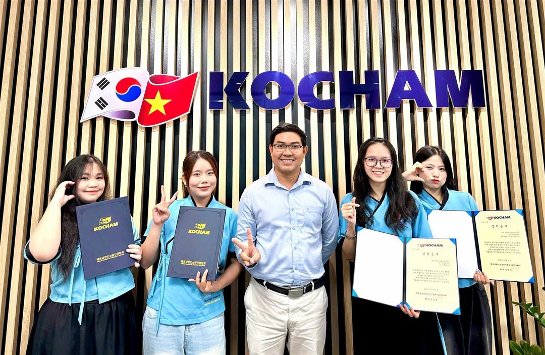 KOCHAM scholarship recipients in a memorable photo with their lecturer